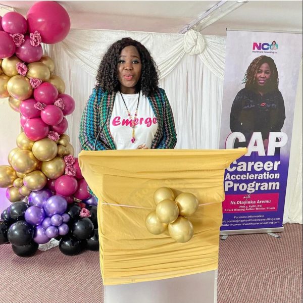 Coach Ola on the podium