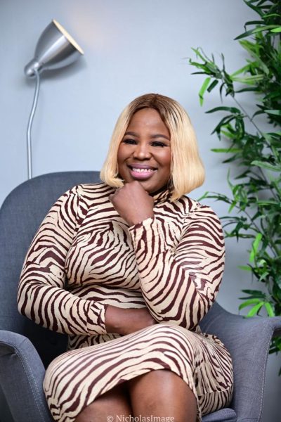 Olayinka Aremu Sitting down